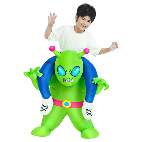 Child wearing bright green inflatable alien costume carrying the wearer on its shoulders