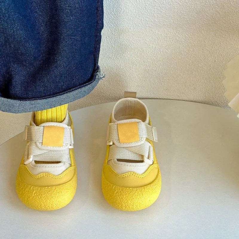 Sunny yellow hook-and-loop play shoes from the front