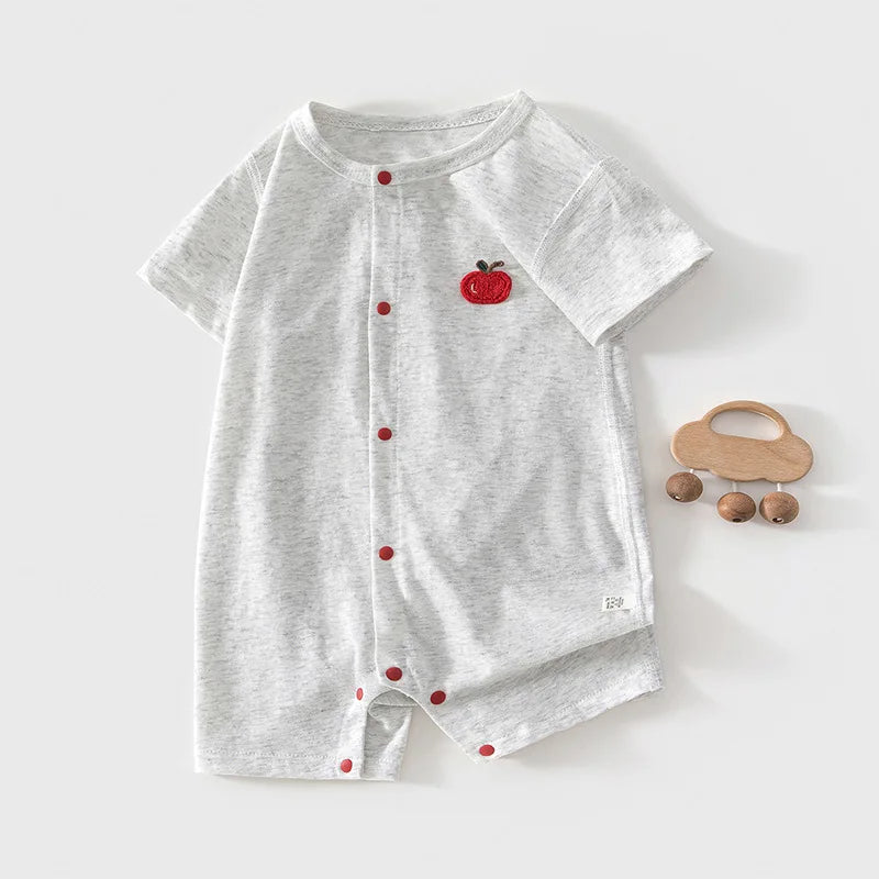 Folded Apple Patch Romper showing soft fabric