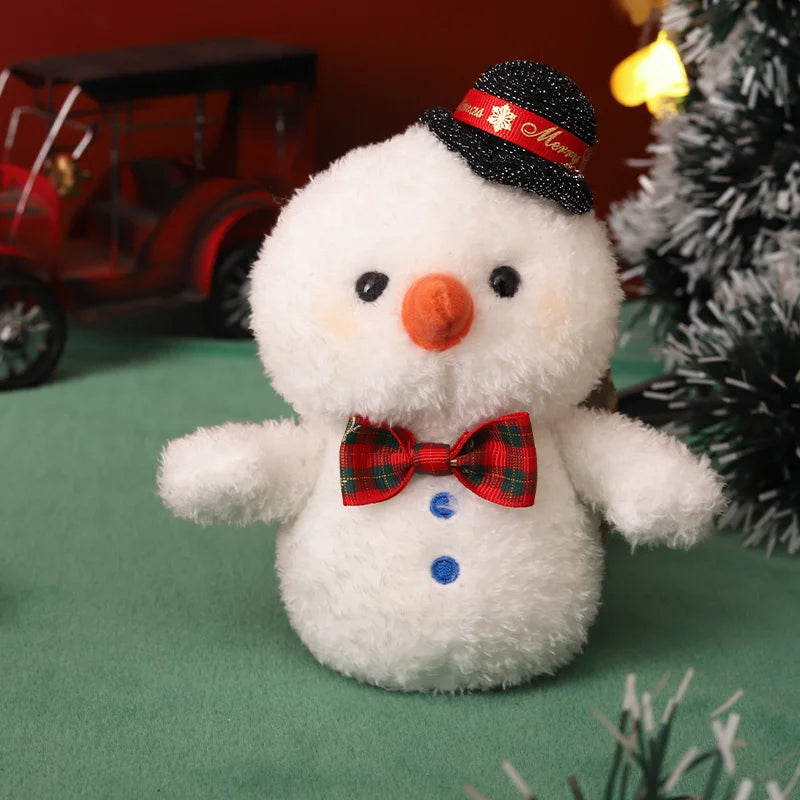 Snowman Christmas plush figure with a black top hat, an orange nose, and a red plaid bow