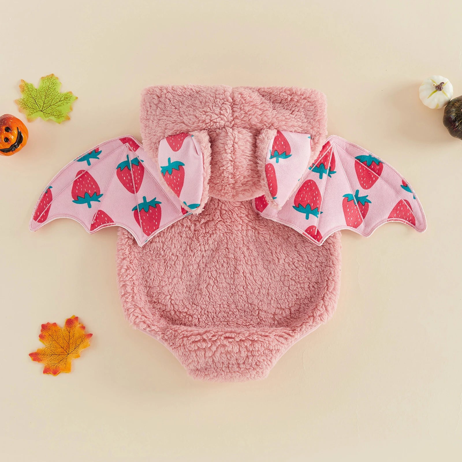 Pink infant romper costume with strawberry bat wings and hood with ears