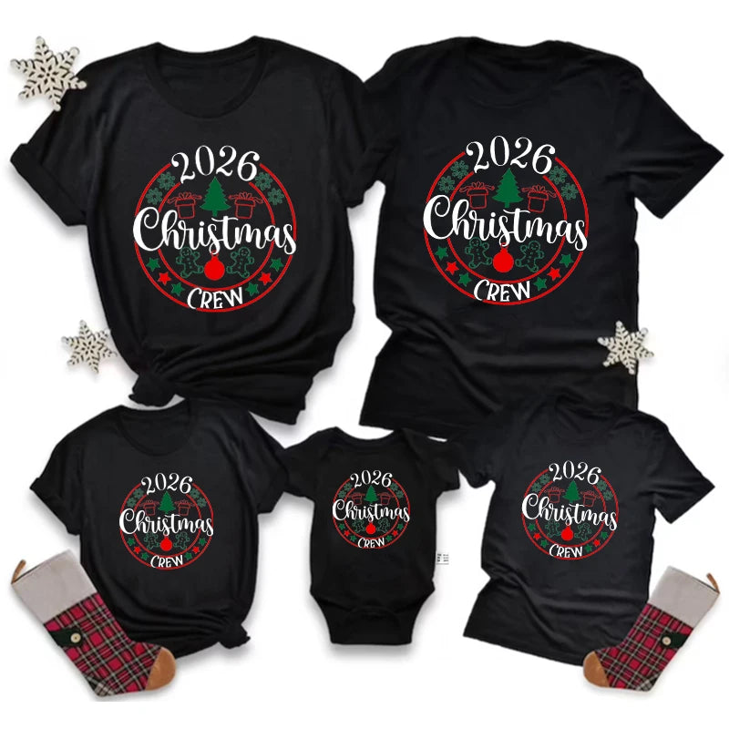 Black adult and child T-shirts and a baby bodysuit with a circular red-and-green 2026 Christmas Crew design.