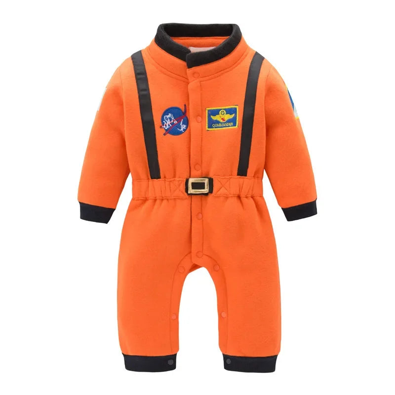 Bright orange astronaut romper with black belt and patches