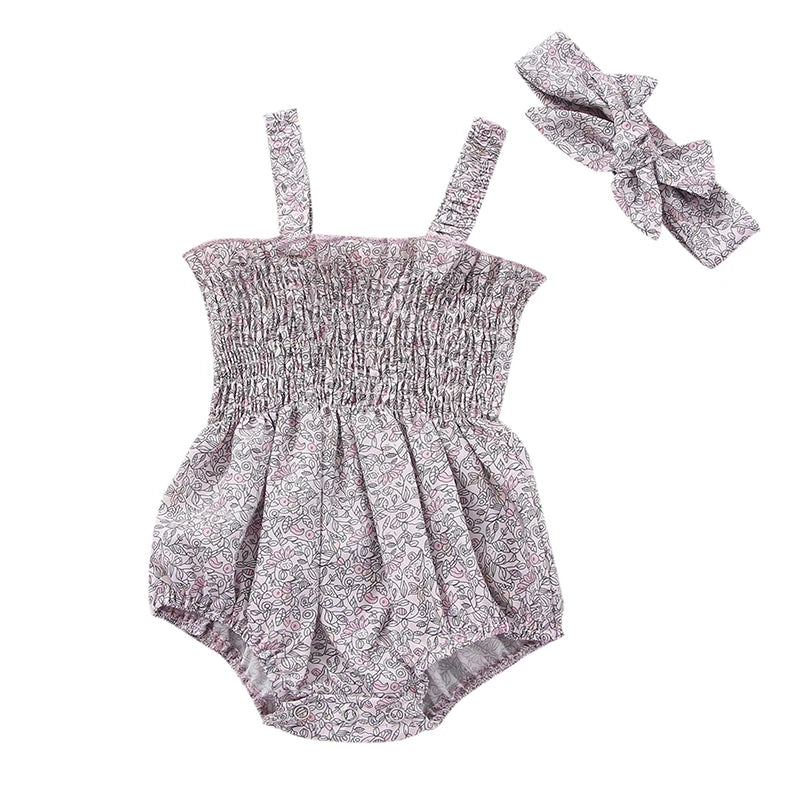 Baby girl romper in playful colors and prints
