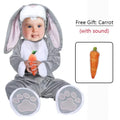 Infant wearing grey bunny romper costume with hood and floppy ears holding a toy carrot