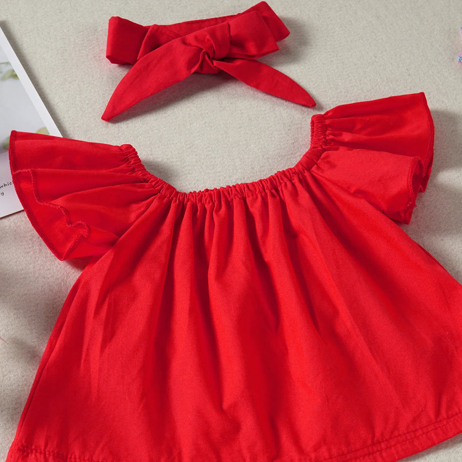 Gathered neckline and flutter sleeves on the crimson top