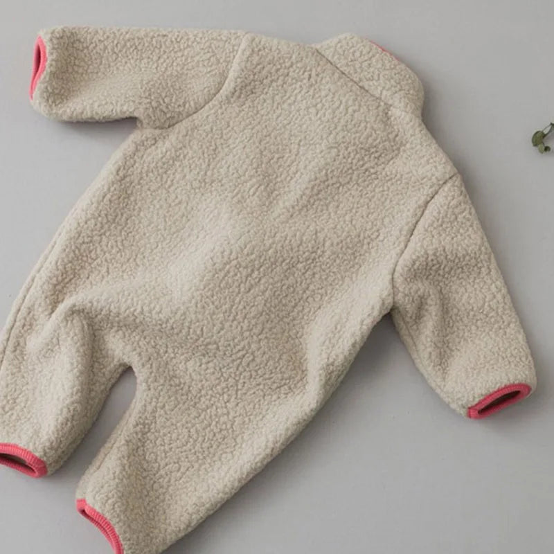 Baby wearing Warm Lamb Fleece Patchwork Romper outdoors