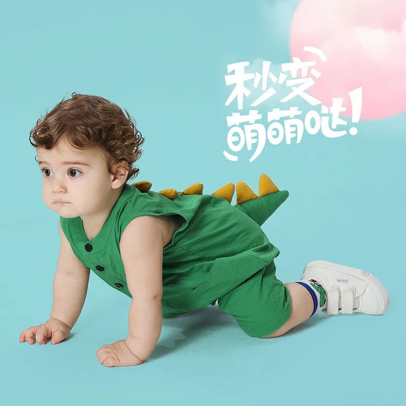 Baby crawling in green dinosaur tail romper costume