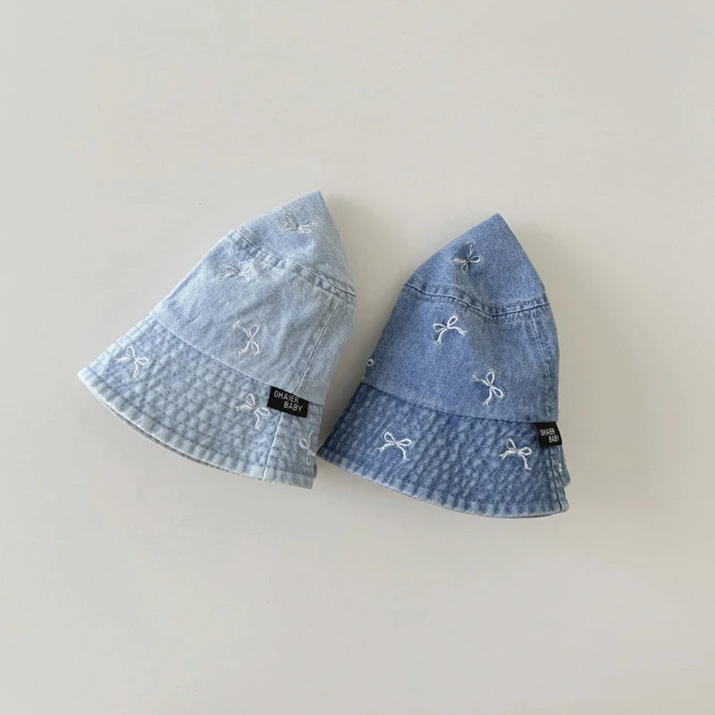 Baby wearing Bow Detail Fisherman Hat outdoors