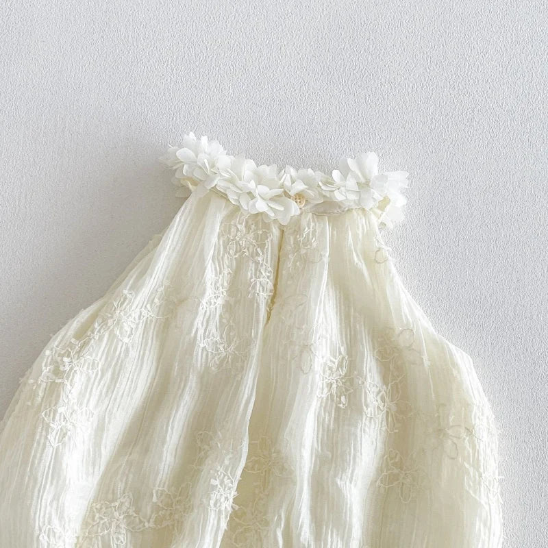 Baby wearing Lace Ruffle Neck Romper playing comfortably