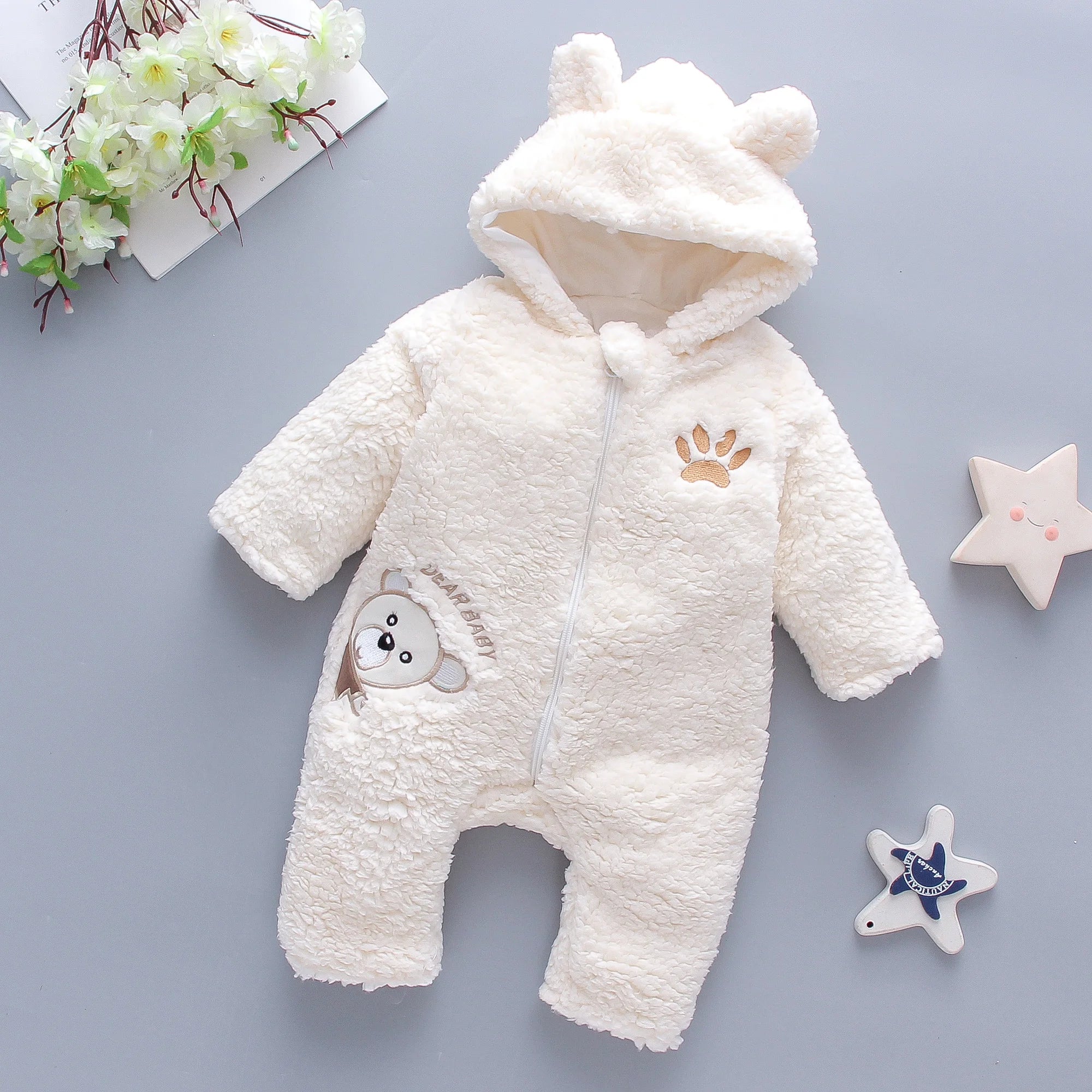 Khaki colored lamb hair baby romper with hood and zipper closure