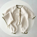 Baby Romper Set Laid Flat Showing Hat and Romper