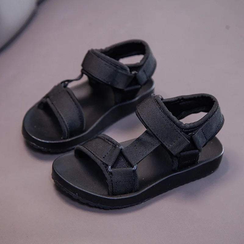 Black sport sandals in a three-quarter view