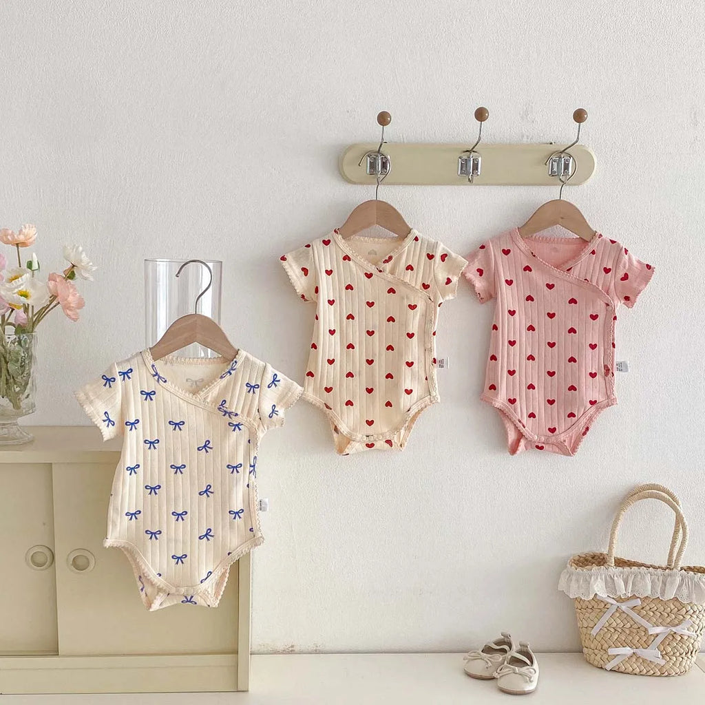 Printed Short-Sleeved Baby Bodysuit close-up of fabric pattern