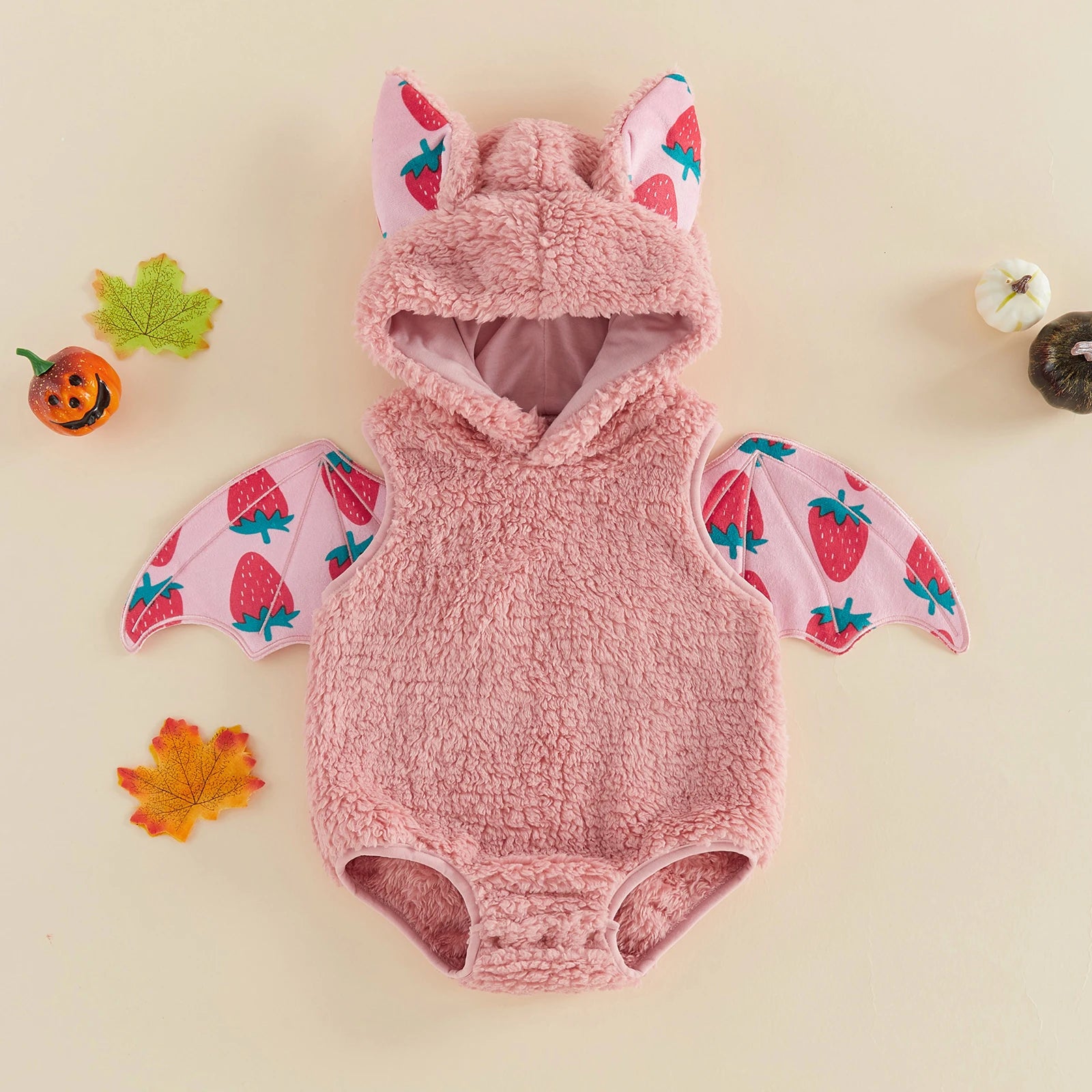Pink infant romper costume with strawberry bat wings back view