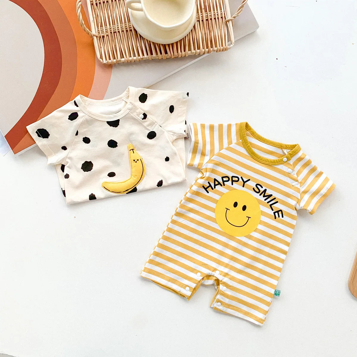 Baby girl wearing short sleeve striped cotton romper