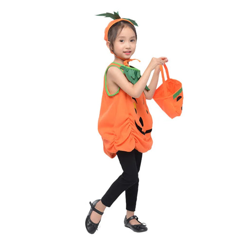 Child wearing orange pumpkin costume tunic with matching hat and pumpkin bag