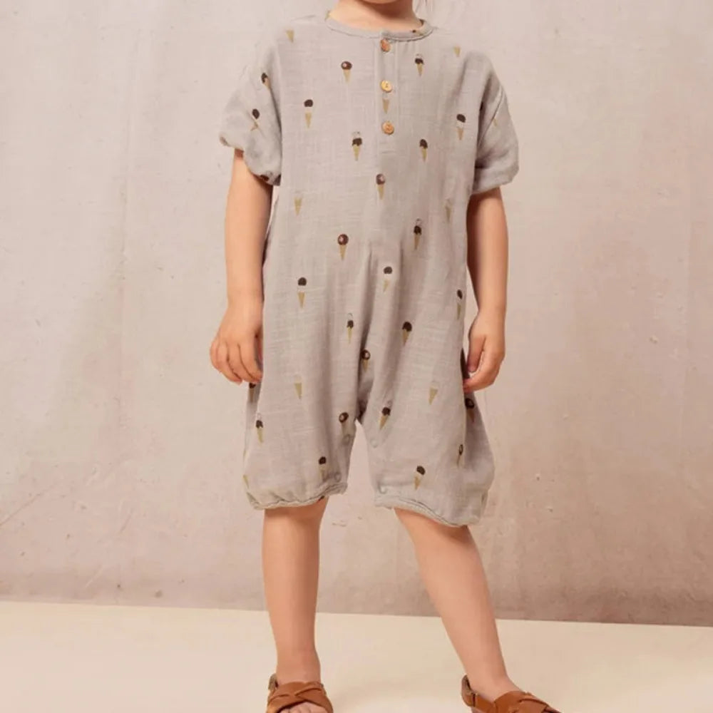 Baby wearing Triangle Neck Cotton Romper playing comfortably