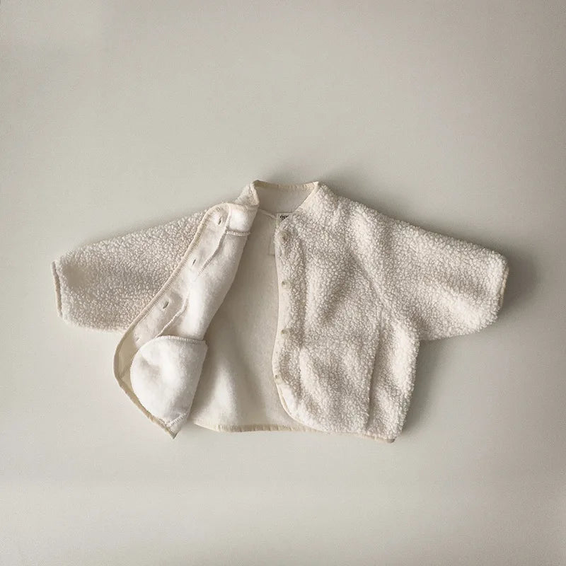 Children's winter coat displayed on hanger in khaki color