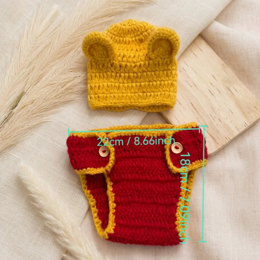 Yellow crochet bear hat and red diaper cover with yellow trim with measurements