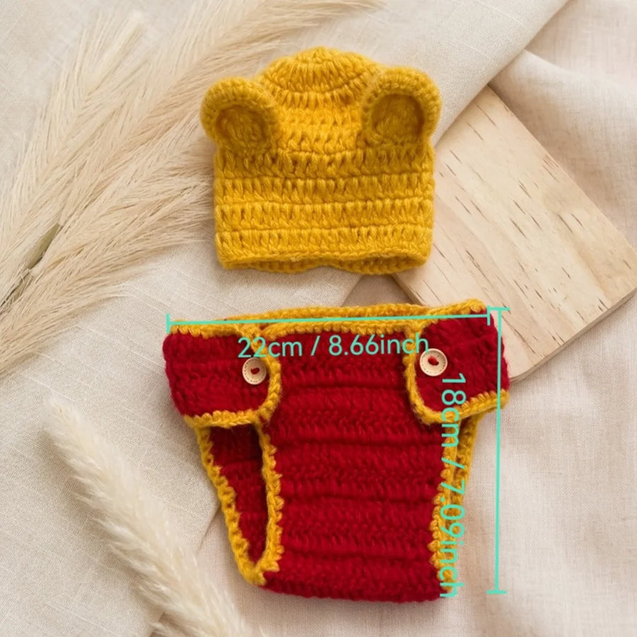 Yellow crochet bear hat and red diaper cover with yellow trim with measurements