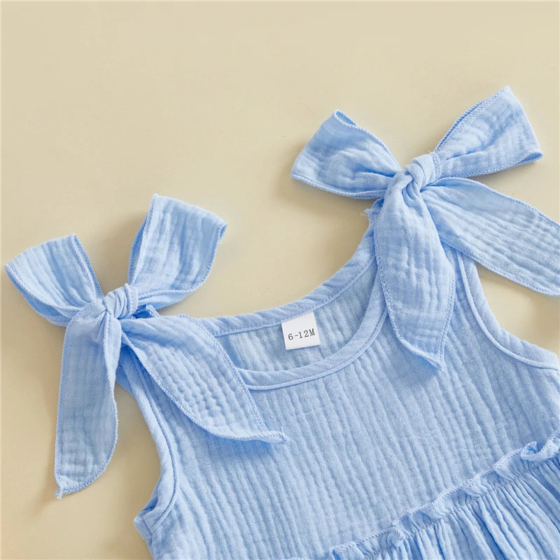 Adjustable tie-shoulder and scoop-neck detail in Powder Blue