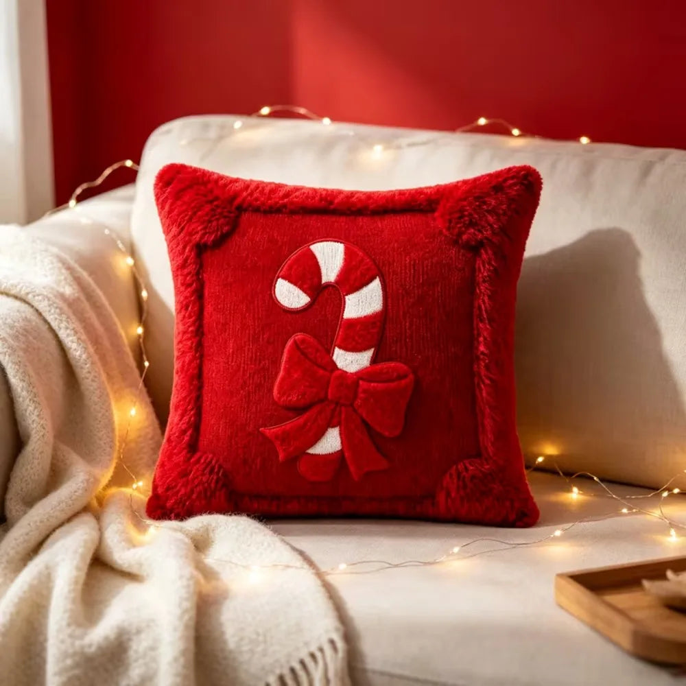 Red square Christmas pillow cover with a candy cane and bow design