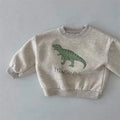 Child Wearing Cartoon Dinosaur Pullover Sweatshirt