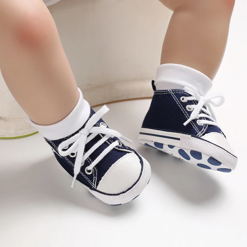 Navy Blue Classic Canvas baby sneakers being worn