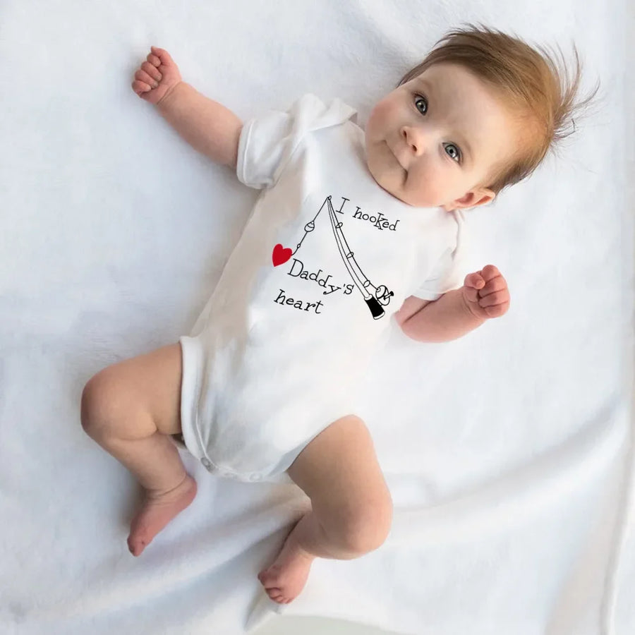 Close-up of Daddy's Heart Print on Baby Romper