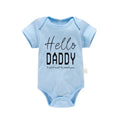 Front view of Coming Soon Letter Romper with letter print