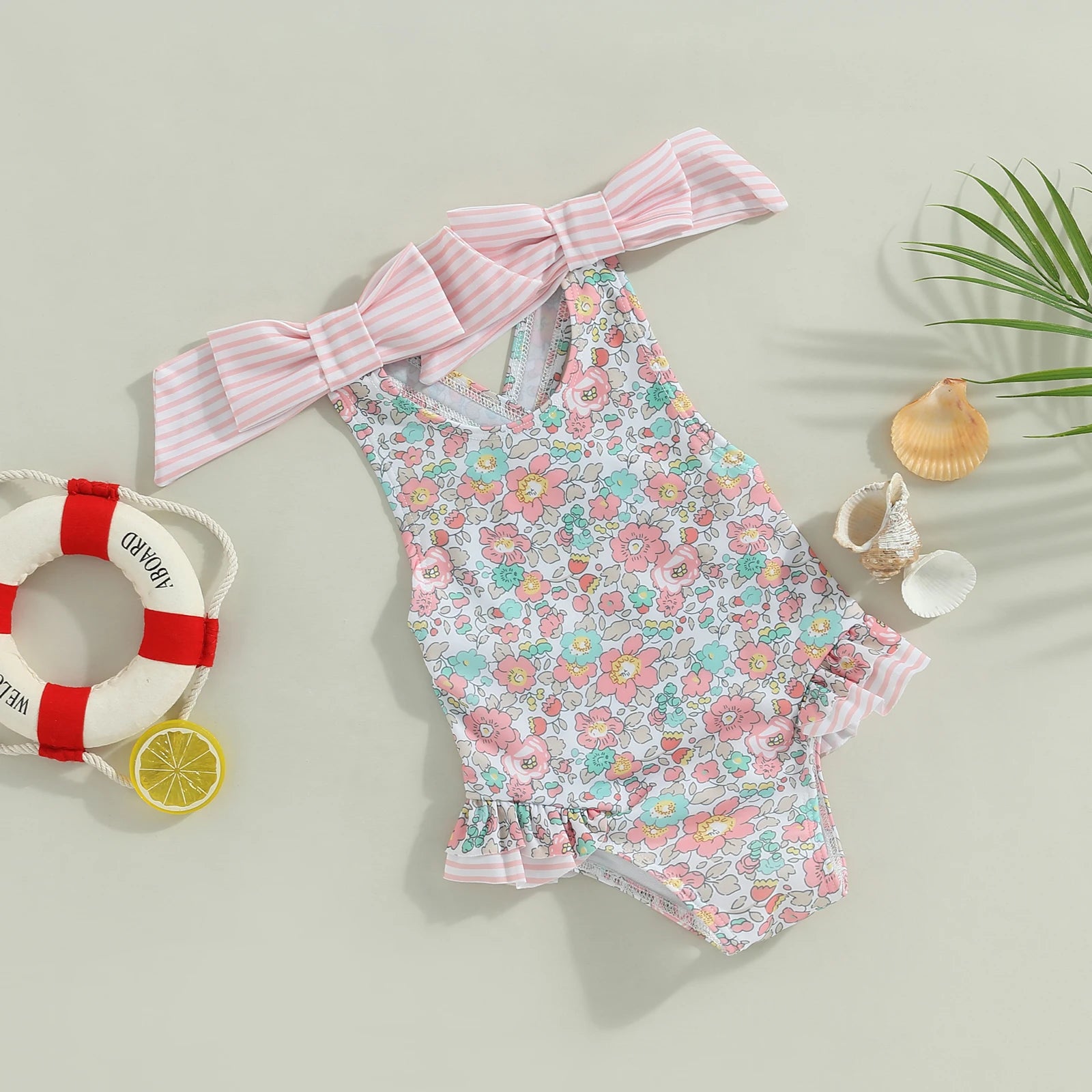 Back view showing bow detail on Floral Bow Backless Swimsuit