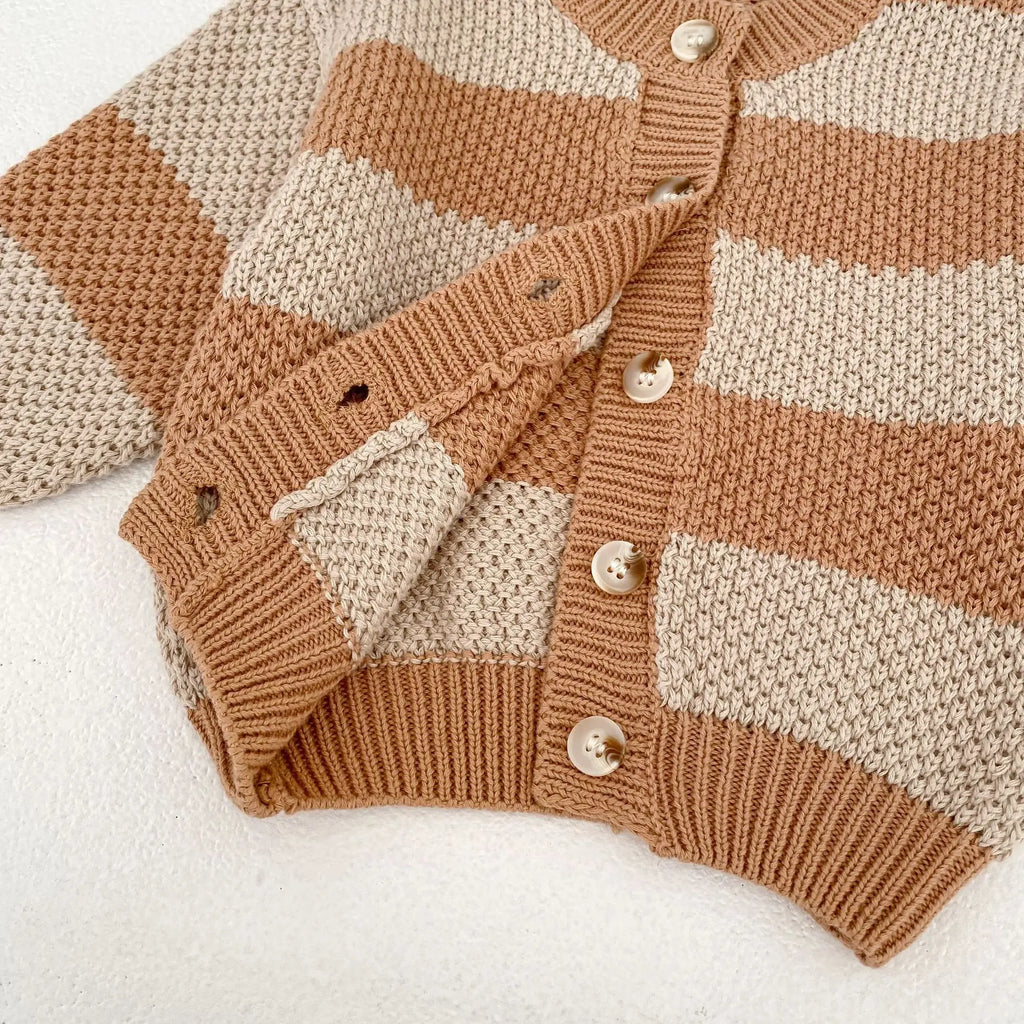 Striped knitted cardigan sweater jacket detail showing soft cotton fabric