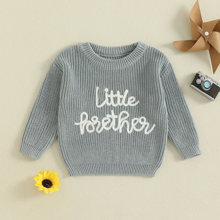 Gray Little Brother embroidered knit sweater with simple nursery props