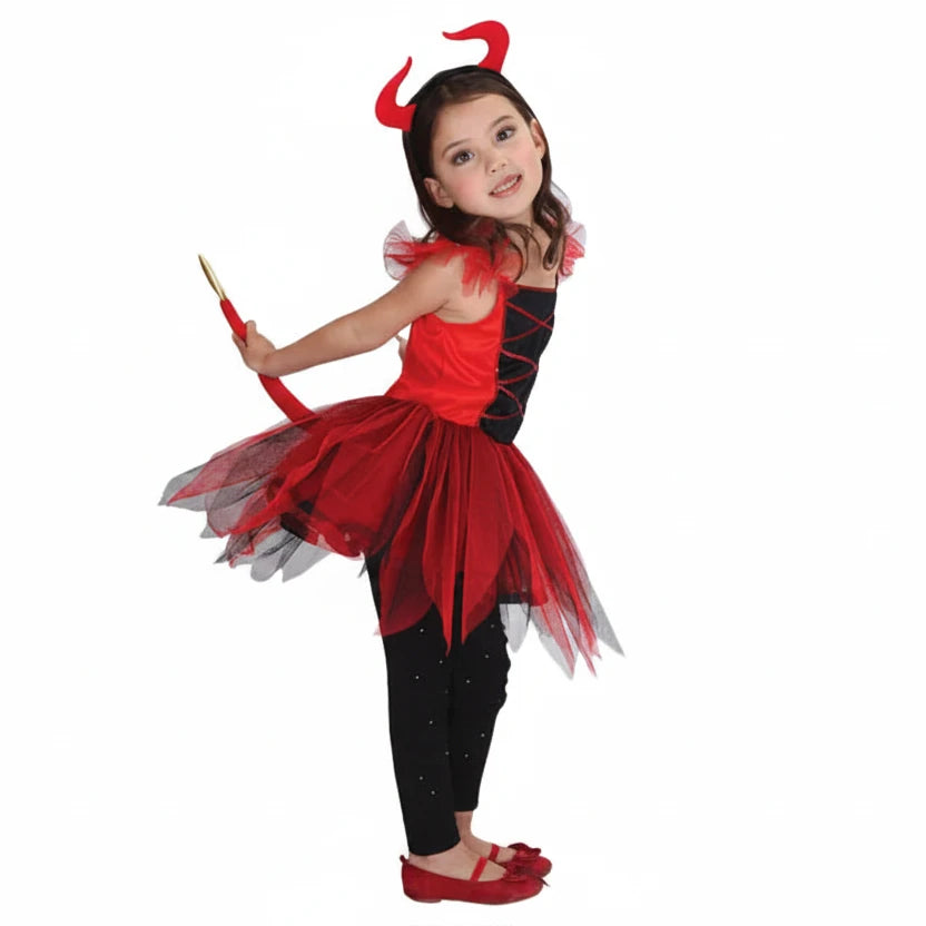 Girl wearing red and black devil costume dress with headband horns and tail accessory