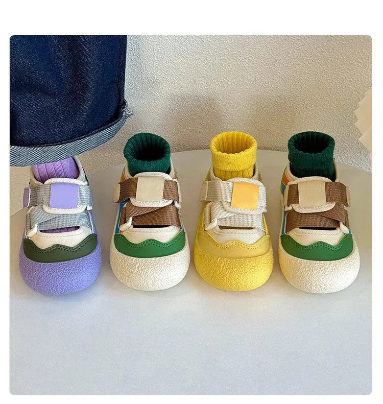 Lilac, green colorblock, and sunny yellow play shoes in a front lineup