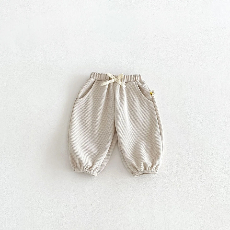 Child Wearing Loose Waffle Knit Pants Outdoors