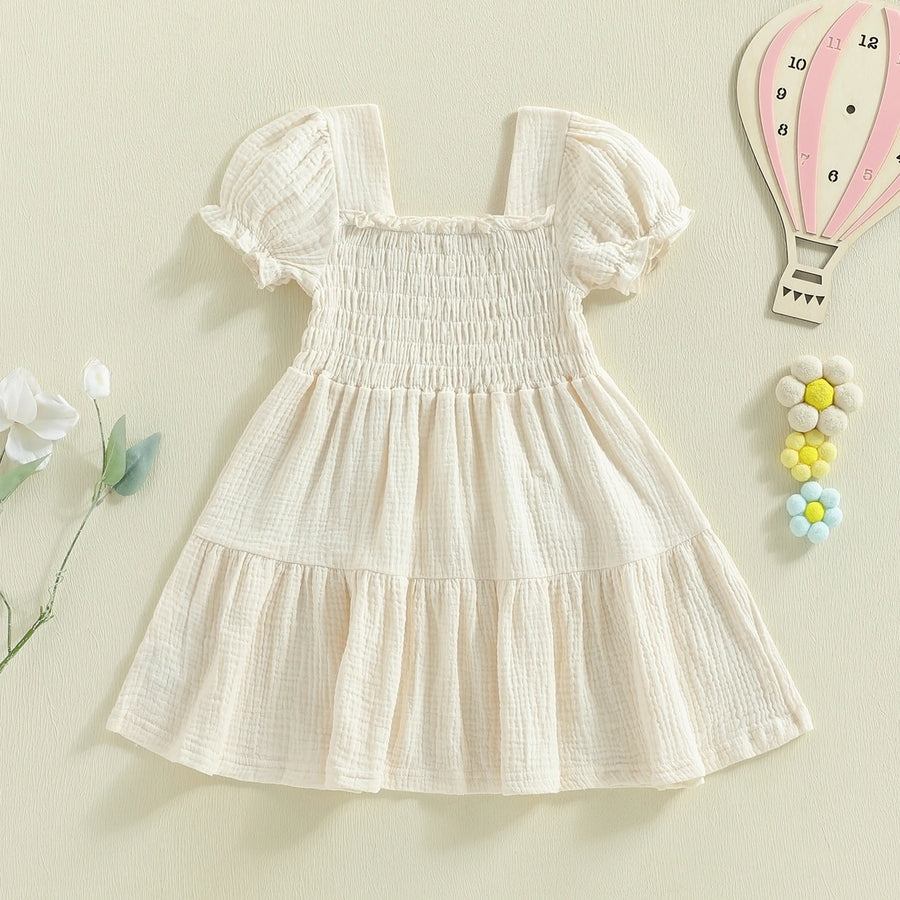 Ivory smocked puff-sleeve dress front view
