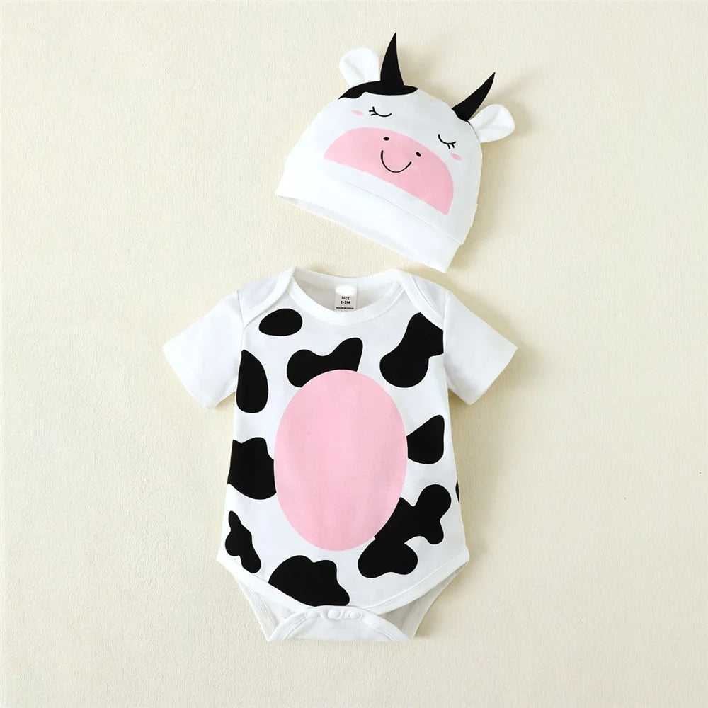 Newborn cow print romper with matching hat featuring cow face and horns