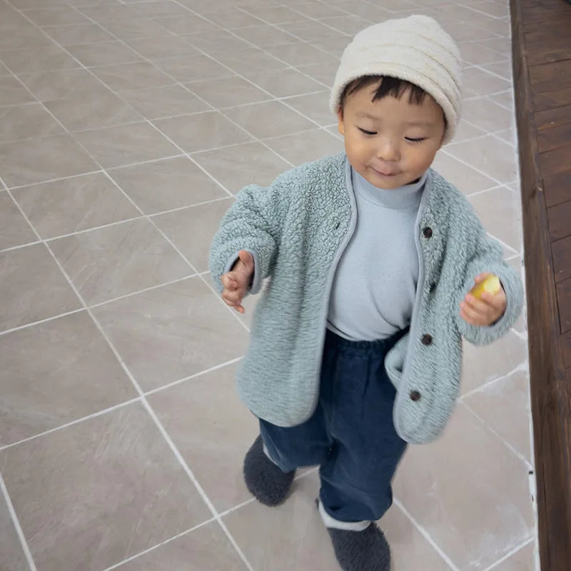 Full sleeve detail of children's winter lamb wool coat