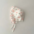 Floral Ear Protection Baby Hat displayed on mannequin