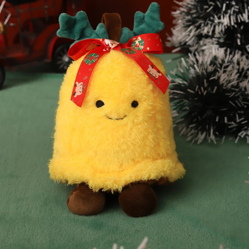Christmas bell plush figure with a yellow bell shape, a smiling face, and a red ribbon bow