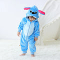Toddler wearing blue animal hooded romper costume with ears and face details on hood