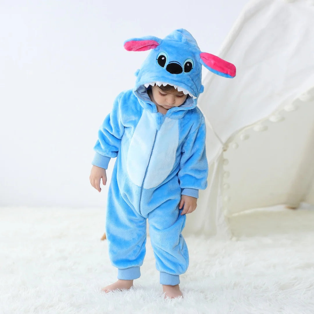 Toddler wearing blue animal hooded romper costume with ears and face details on hood
