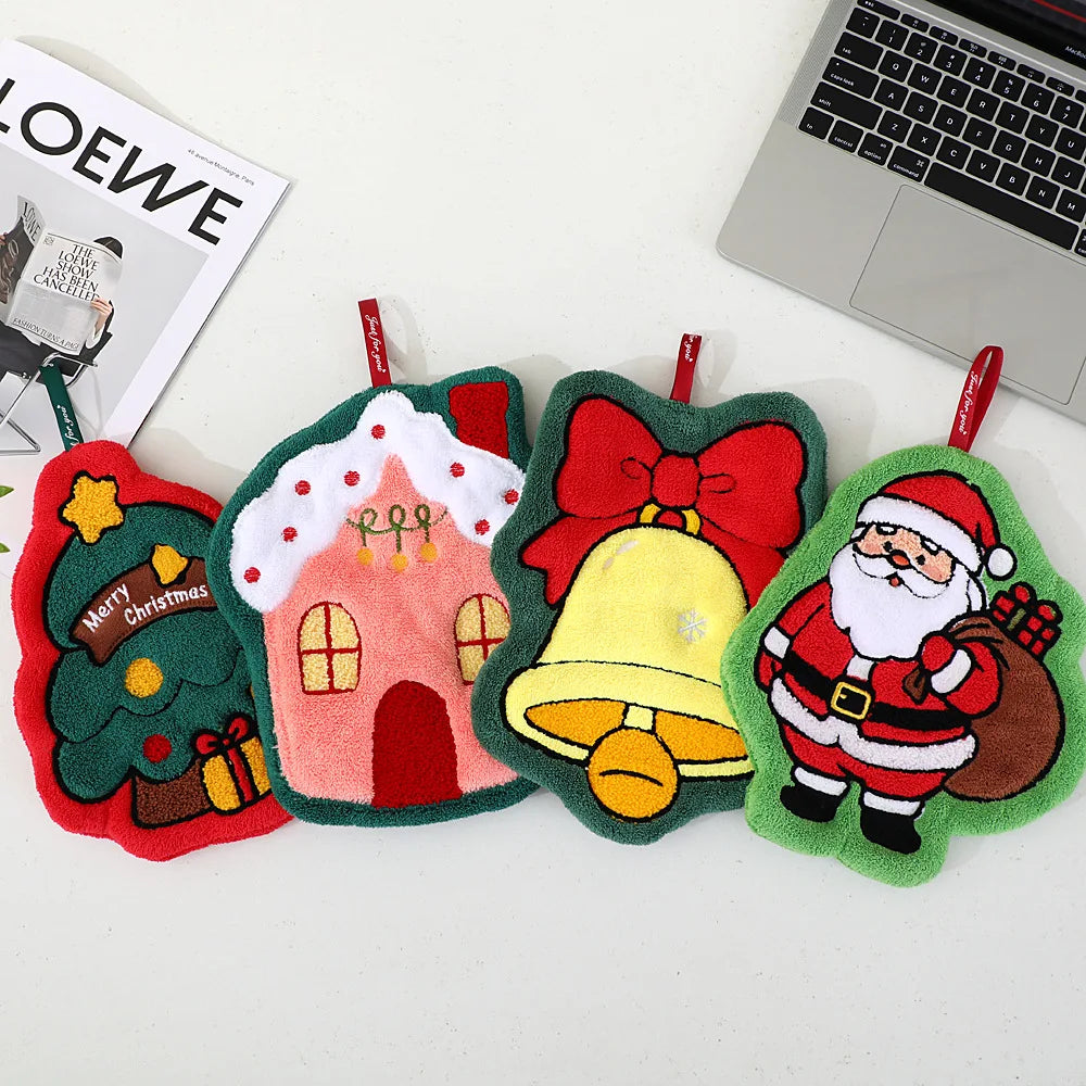 Four Christmas hanging hand towels featuring a tree, snowy house, bell with a bow, and Santa Claus.