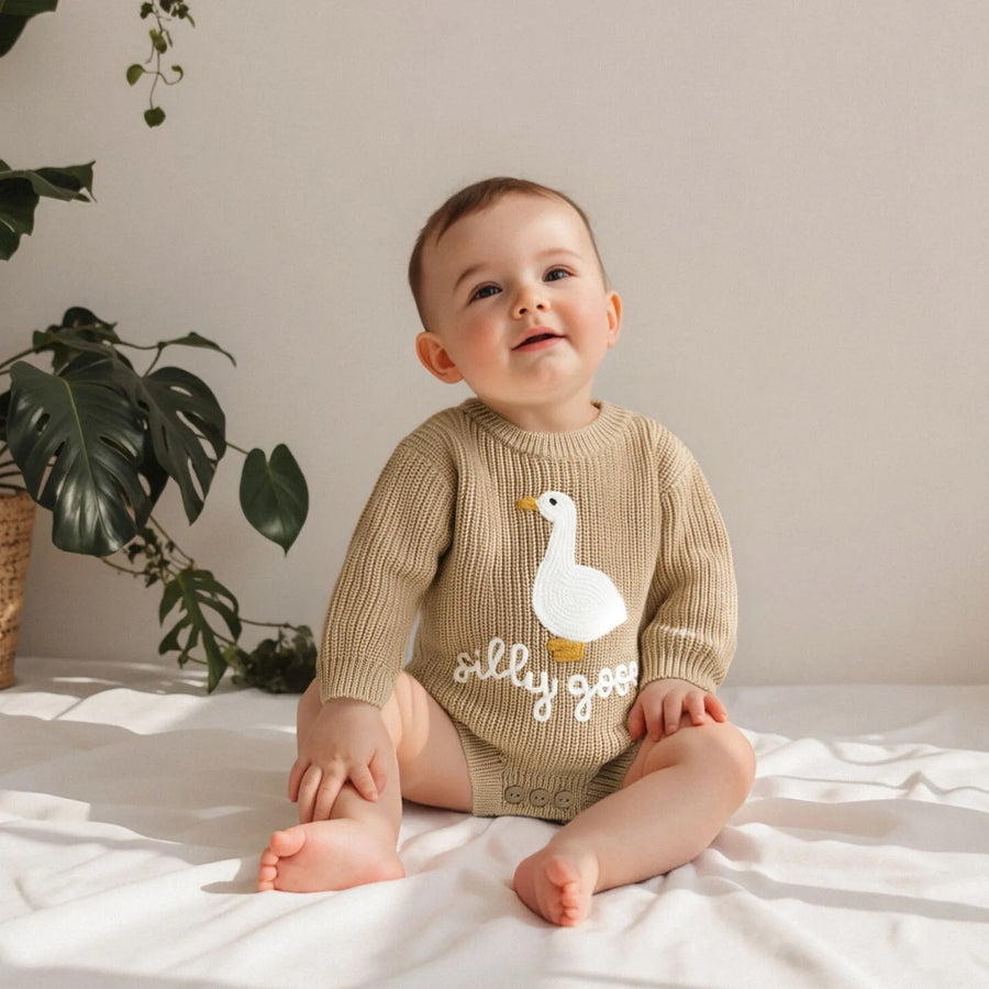 Soft knitted baby romper featuring round neck and embroidered goose design