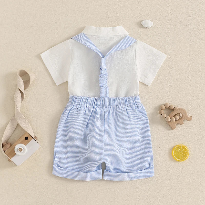 Baby Boy Wearing Navy Gentleman Romper Set with Bowtie and Suspenders