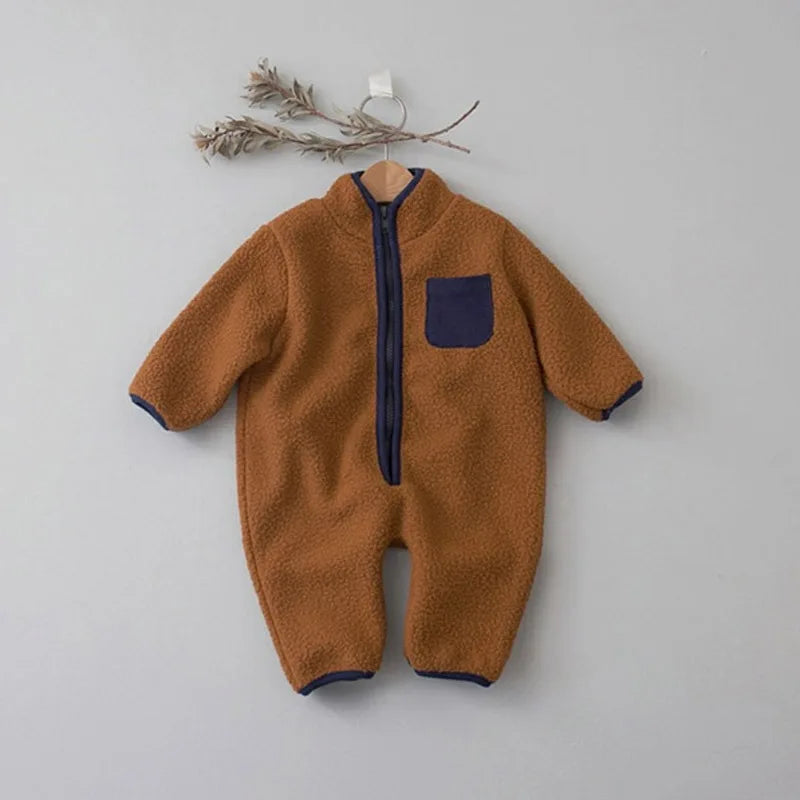 Warm Lamb Fleece Patchwork Romper hanging on hanger
