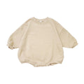 Baby wearing Oversized Basic Sweatshirt Romper side view