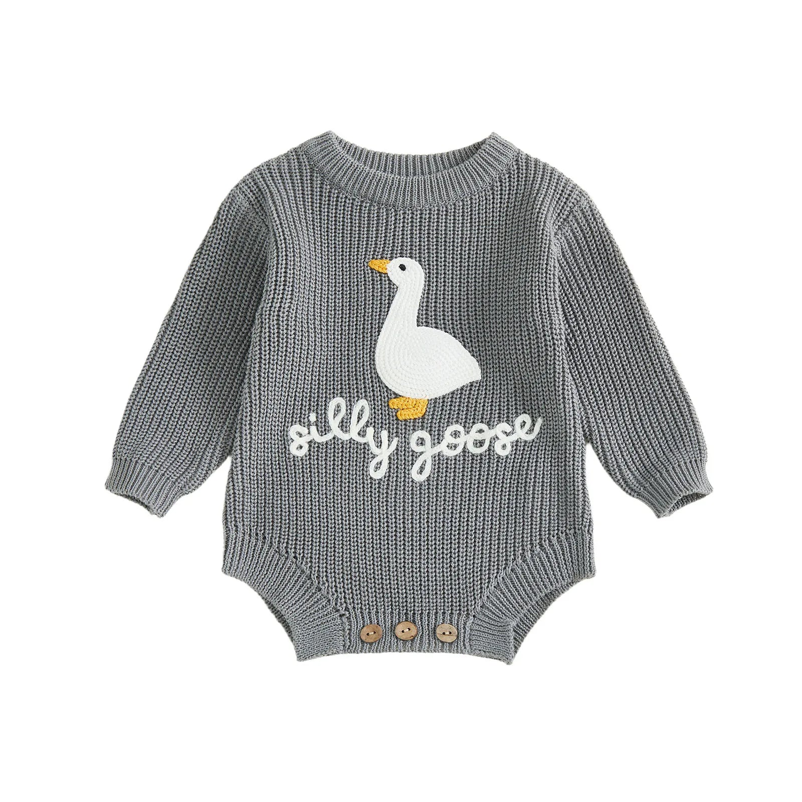 Detail of round neck and long sleeves on knitted baby romper
